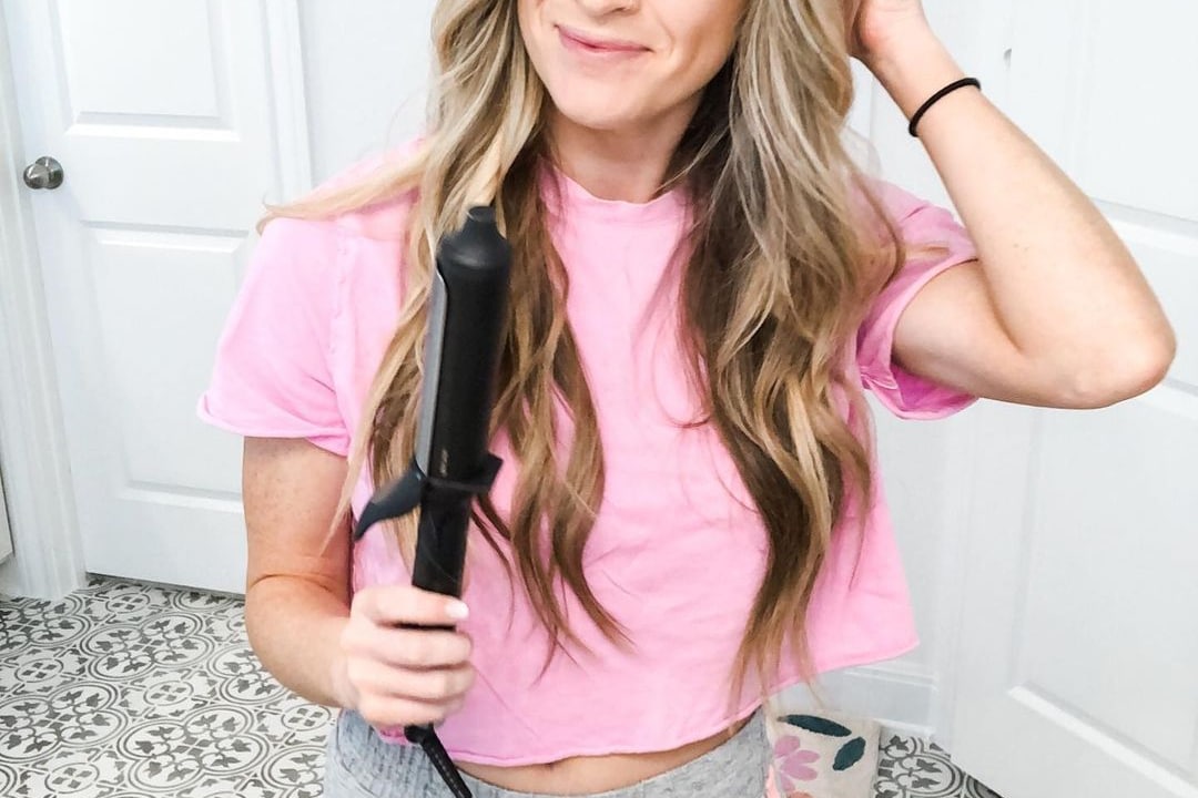 Girl with ghd Curling Iron