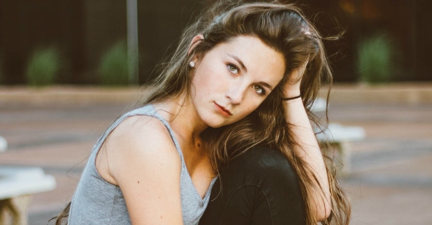 girl sitting on the table