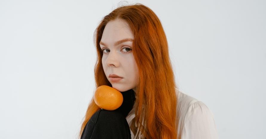 Woman in Black Blazer With Orange Hair