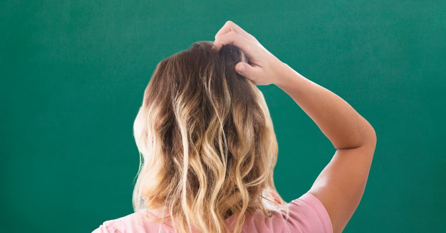 Woman Scratching Her Head